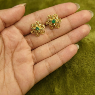 Floral studs with green stone center