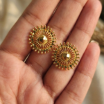 Plain gold color sun shaped studs